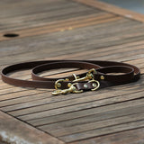 Biothane multi leash with brass hardware, displayed on table. Australian made dog leash